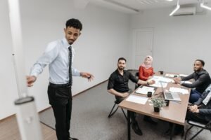 a man showing his presentation in office